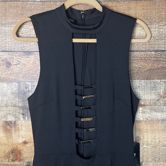 Bebe Gold Bar Detail Jumpsuit Sleeveless Plunging Neckline Black SZ Medium NWT - Picture 3 of 13